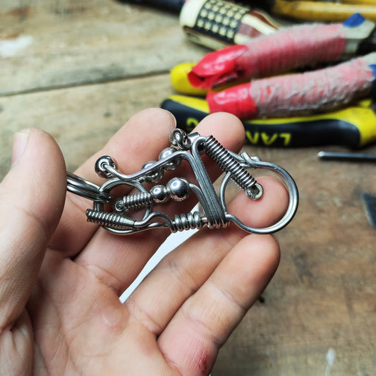 Handmade camping and motorbike keychains as gifts for boyfriends going hiking, camping, or outdoor activities